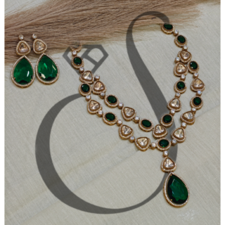 MOISSANITE SET WITH GREEN A.D. STONE