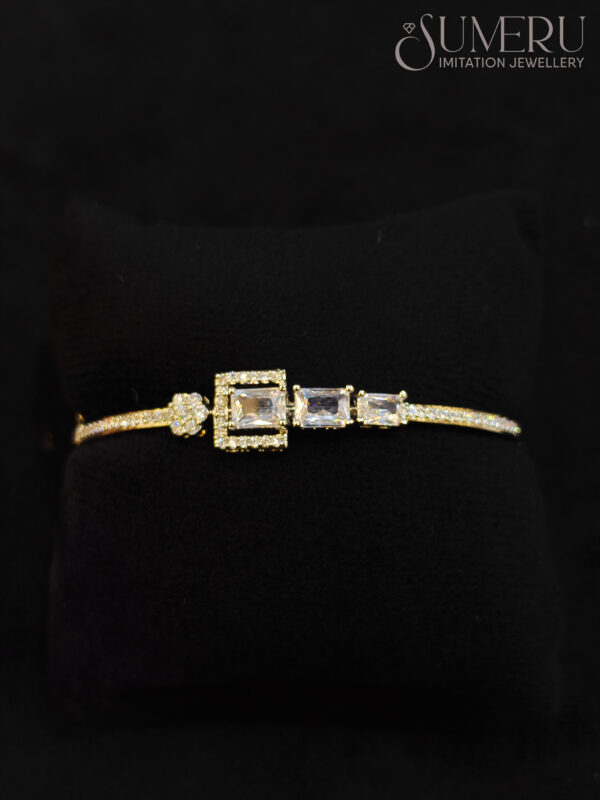 A.D. KADA IN GOLDEN TONE POLISHED