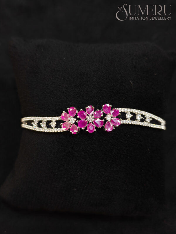 A.D. KADA IN SILVER TONE WITH PINK DARK STONE