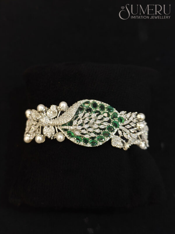 A.D. KADA IN SILVER WITH GREEN STONES