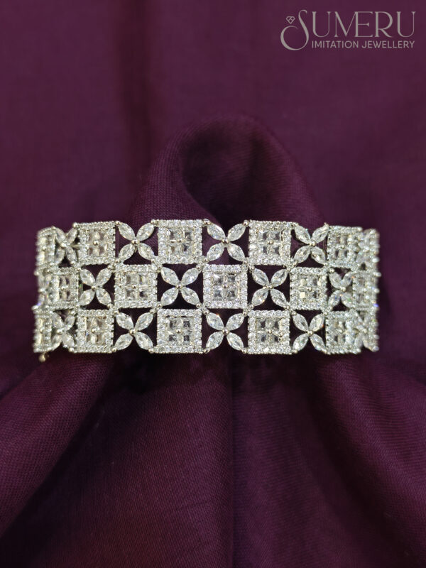 A.D. KADA WITH UNIQUE SQUARE AND FLOWER DESIGN