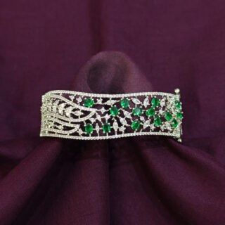 A.D. KADA WITH UNIQUE GREEN LEAF DESIGN