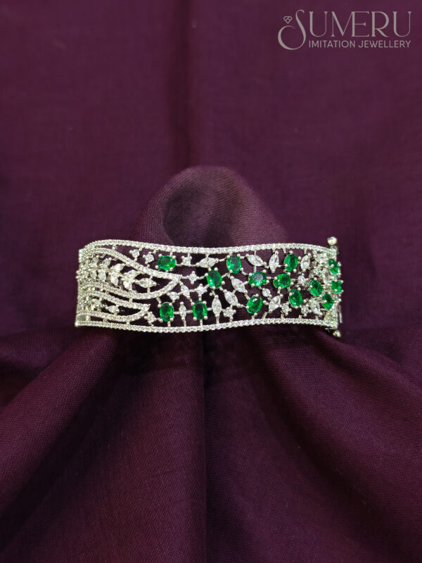 A.D. KADA WITH UNIQUE GREEN LEAF DESIGN