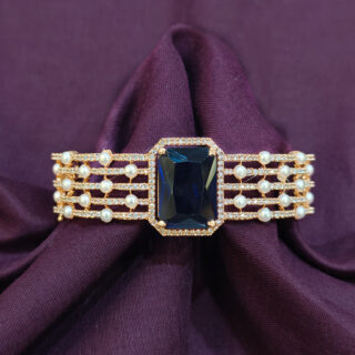 A.D. KADA IN ROSE GOLD WITH BLUE STONE AND PAL